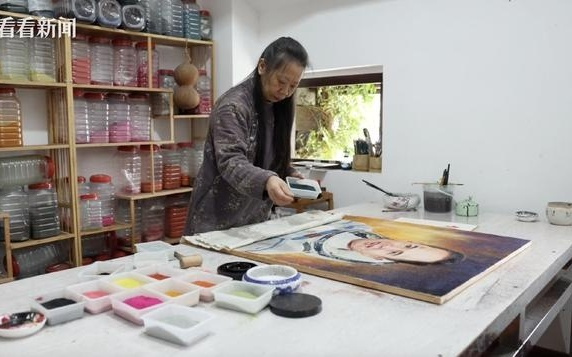 非遗传承人用一幅麻质画隔空致敬英雄航天员张陆